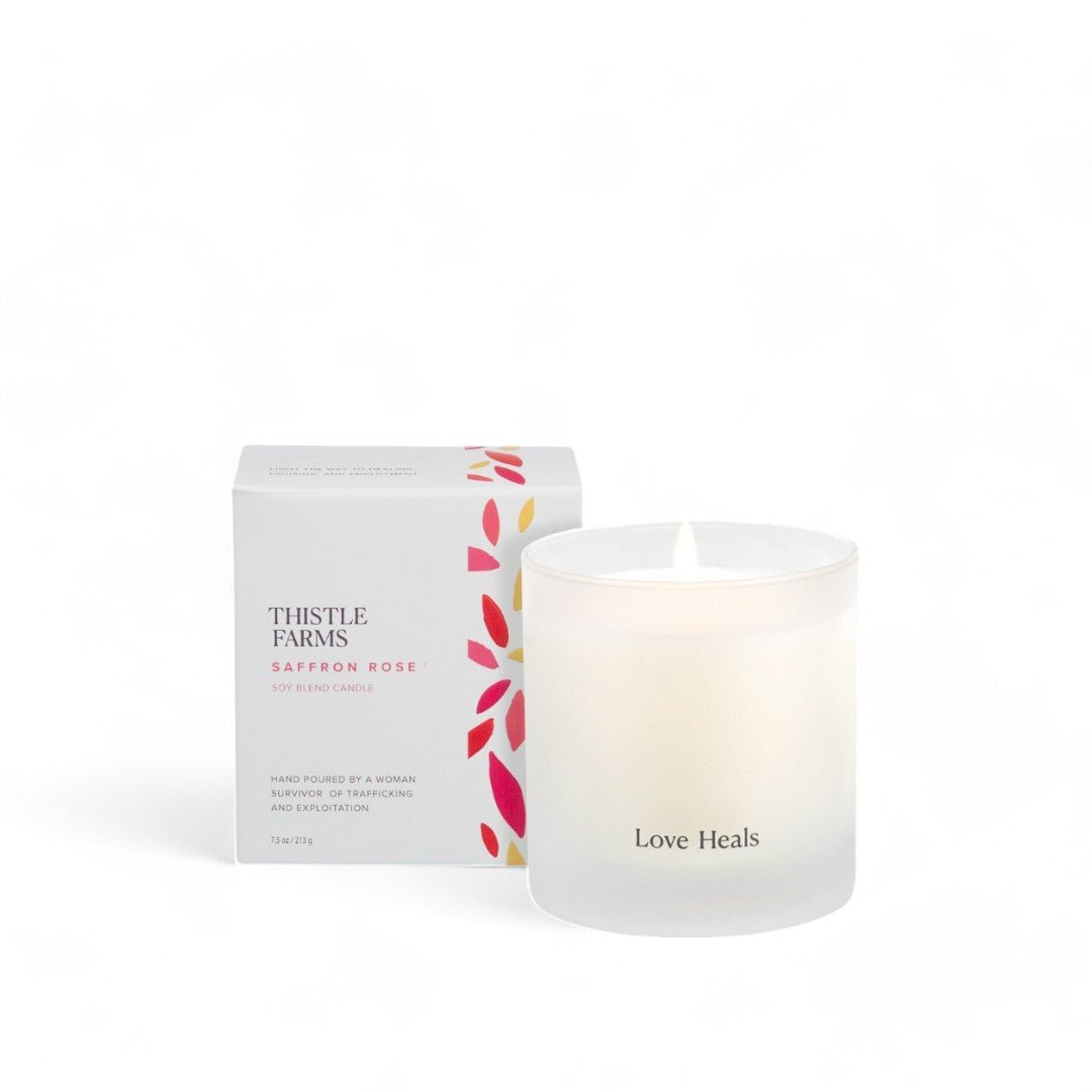 Special for Valentine's Day Gifts, a saffron rose candle with "Love Heals" in frosted jar with the box behind it