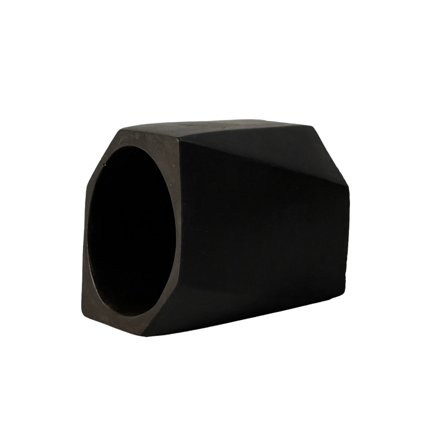 Side view of Geometric planter made out of concrete for holding pens or small plants