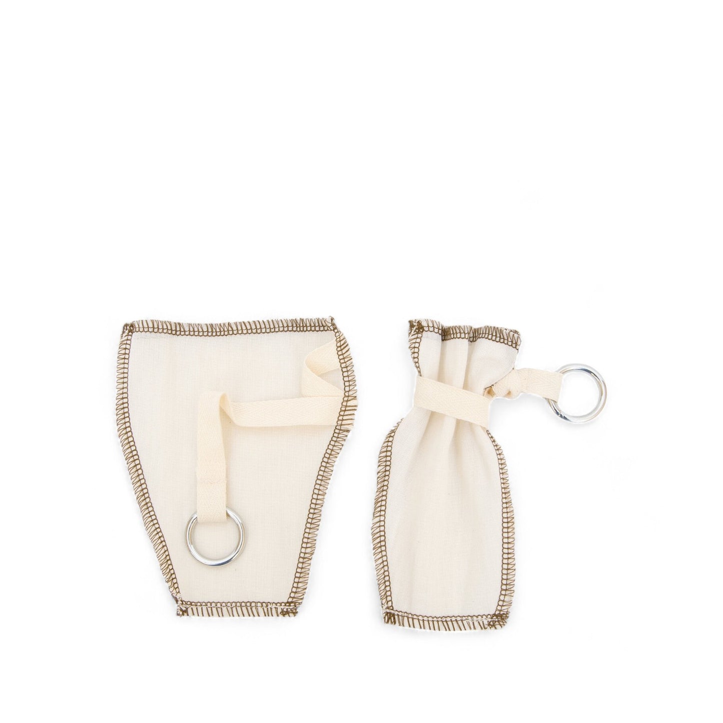 Set of two reusable organic cotton tea filters with stitched edges and a metal ring fastener, against a white background.