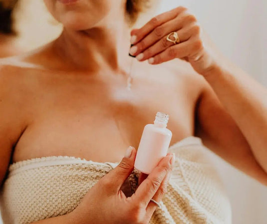Woman using health skin tips after a shower