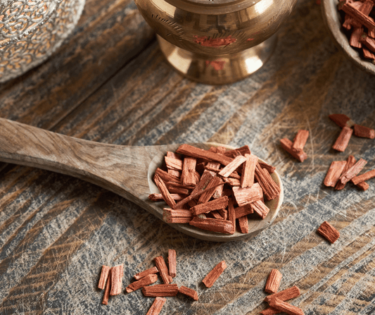 Wooden spoon with sandalwood chips for sandalwood soap