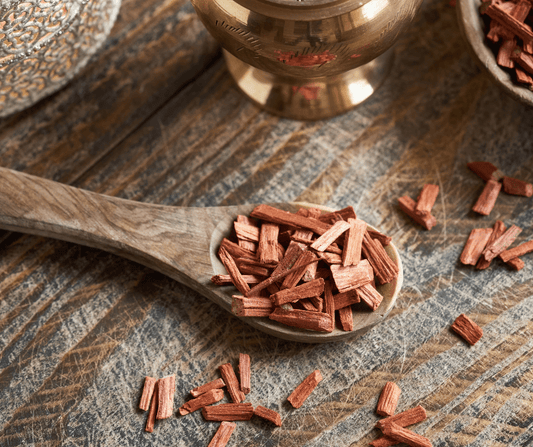 Wooden spoon with sandalwood chips for sandalwood soap