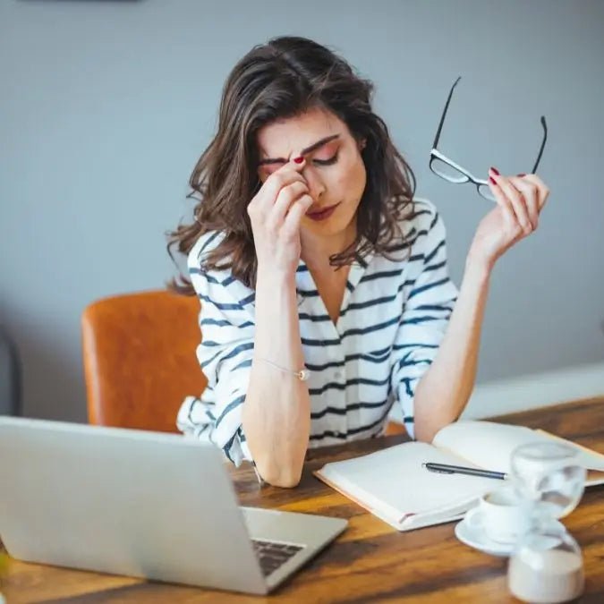 Stressed out woman who needs a self-care gift
