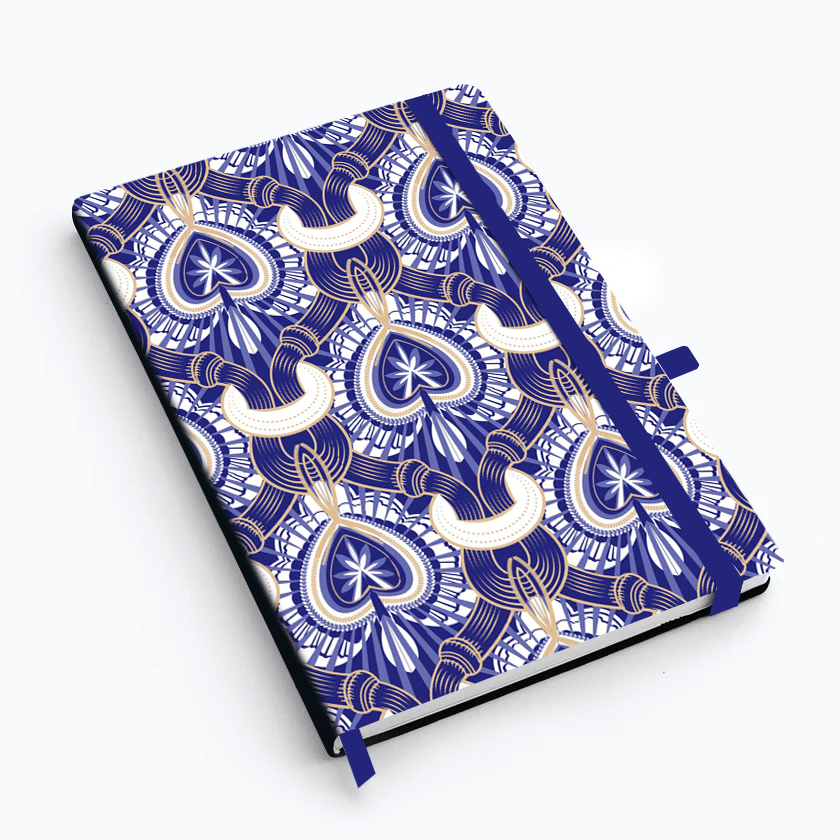 Notebook with a blue and white paisley pattern on a white background