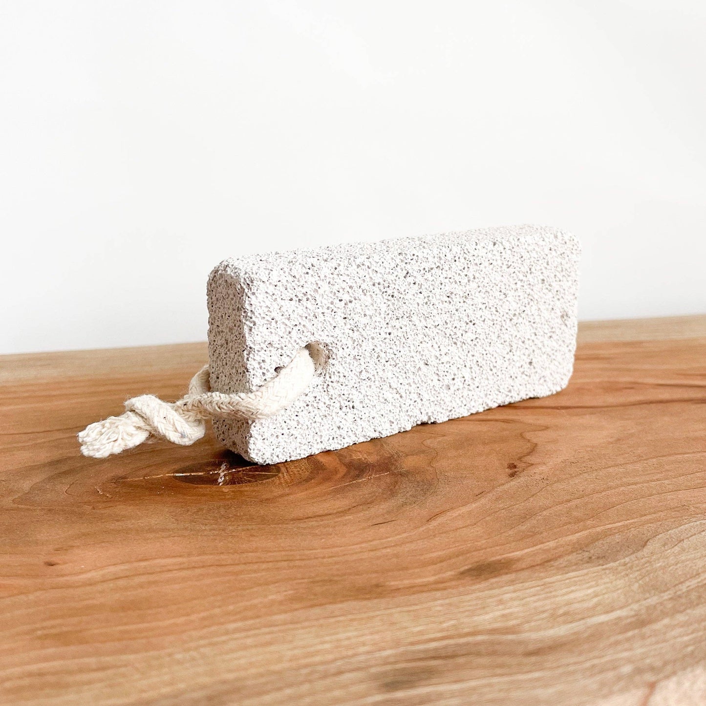 close up view of the pumice stone on a wooden counter