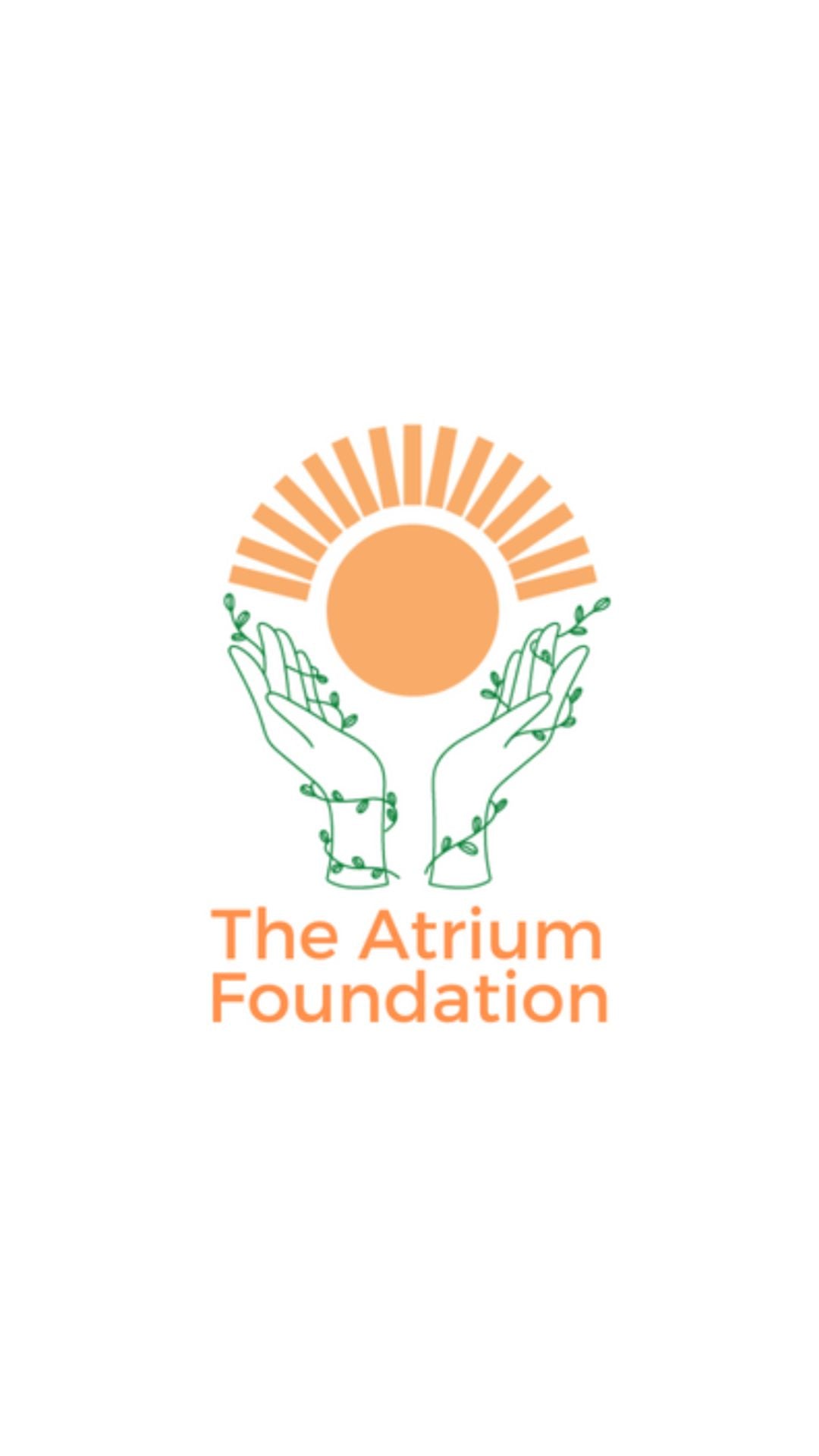 The Atrium Foundation logo with two hands holding up an orange sun