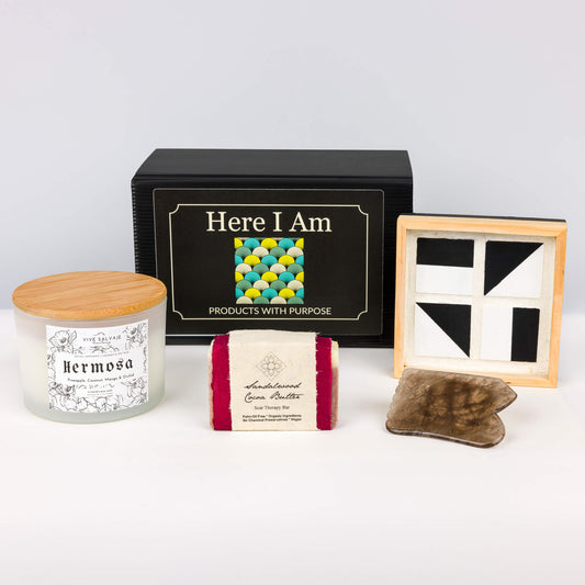 The Beauty Sha Box, a curated ensemble of artisanal treasures including the Hermosa candle, Sandlewood soap, tile tray, and gua sha tool with the iconic black box
