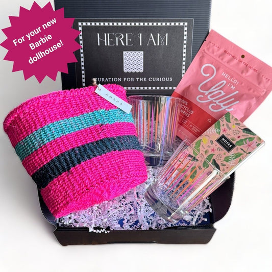 Gift box packed with the home goods in the Cheers to Pink Box: basket, bar glasses, dried cherries, notepad