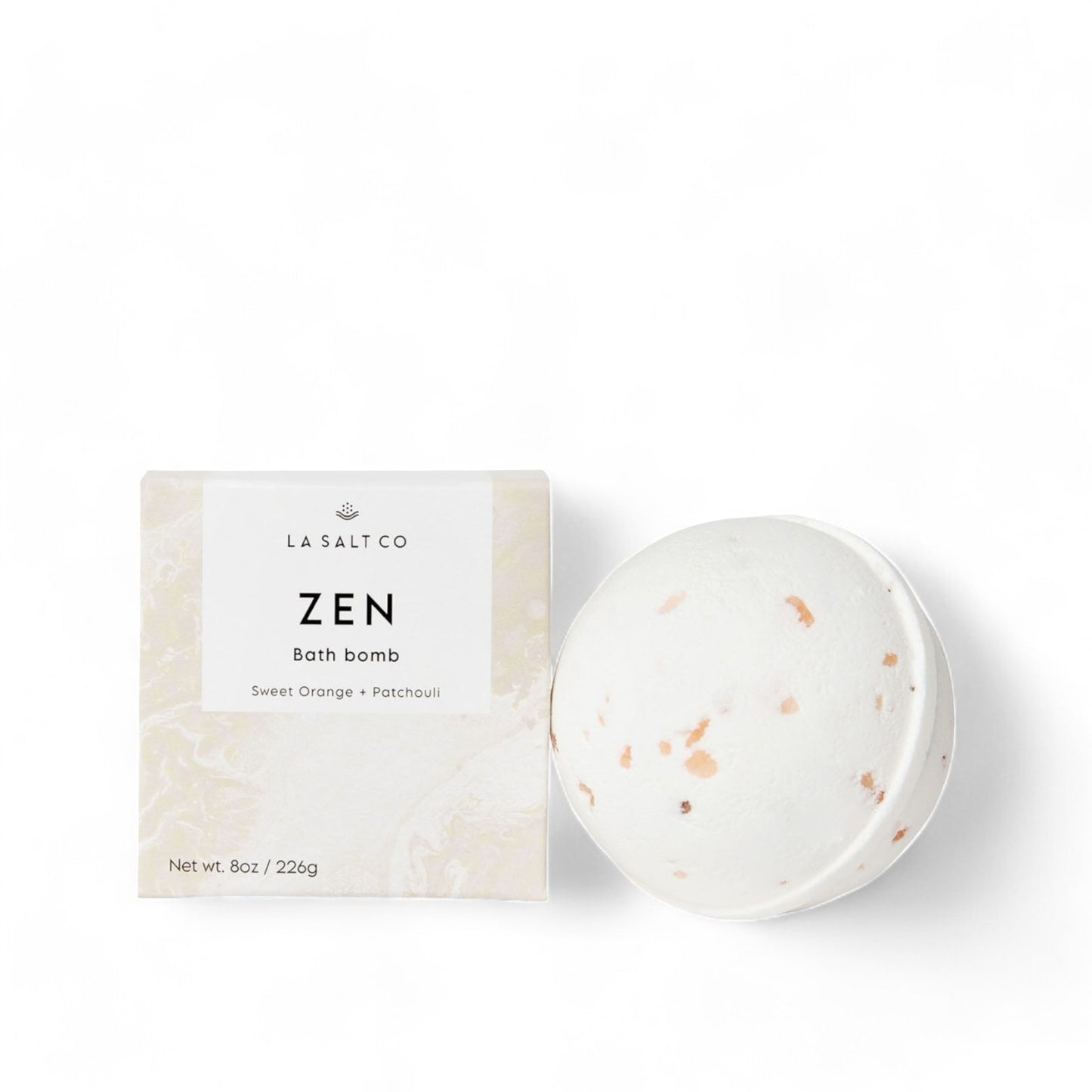 The Zen Bath Bomb next to the product box on white background
