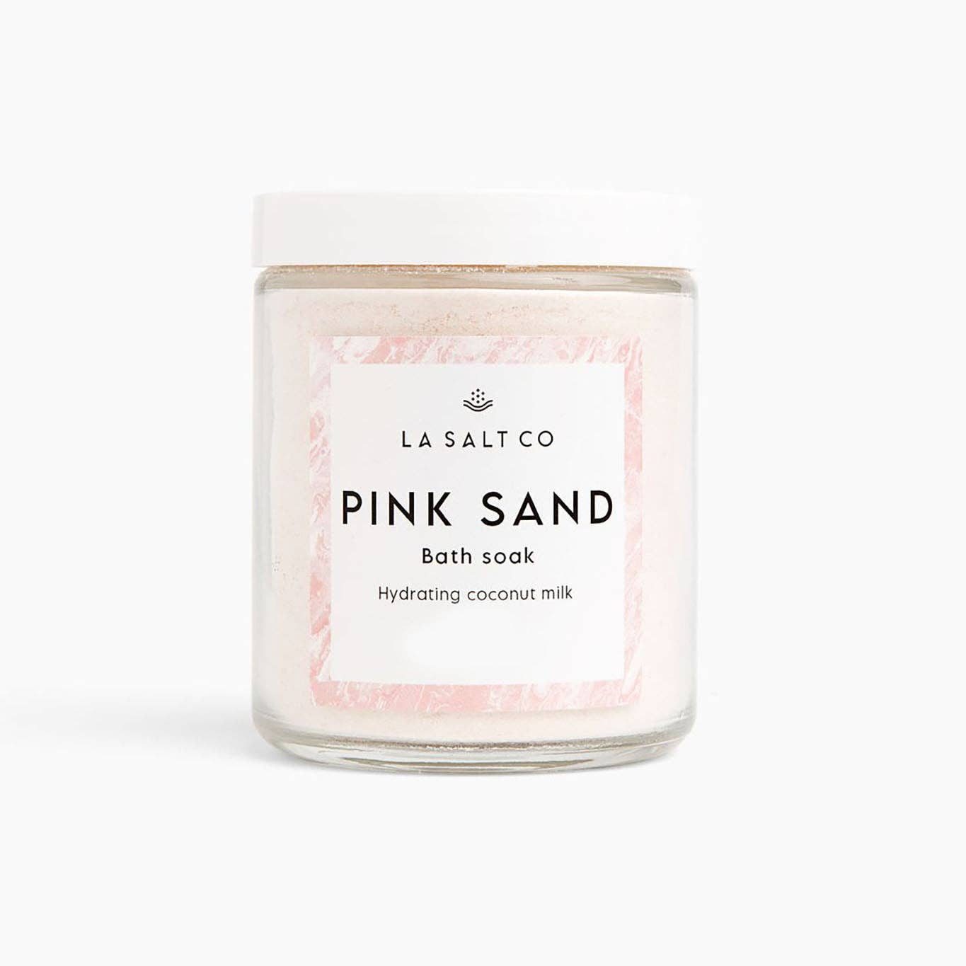Jar of Pink Sand coconut milk bath soak by La Salt Co on a white background