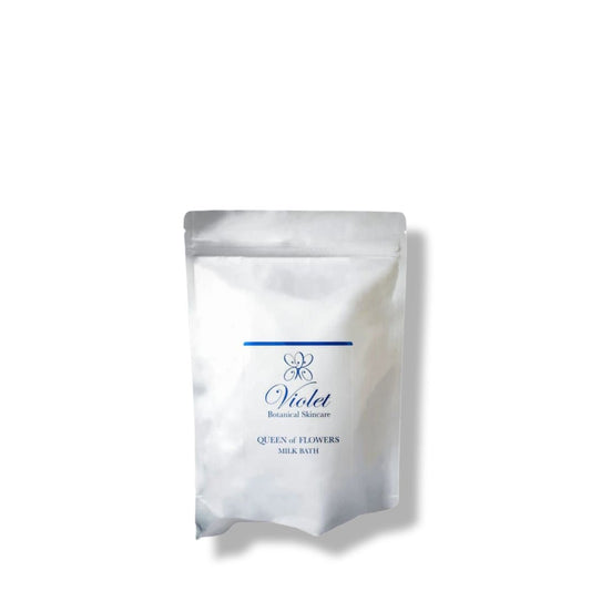 Silver bag of Violet Botanical Skincare "Queen of Flowers" Milk Bath on a white background