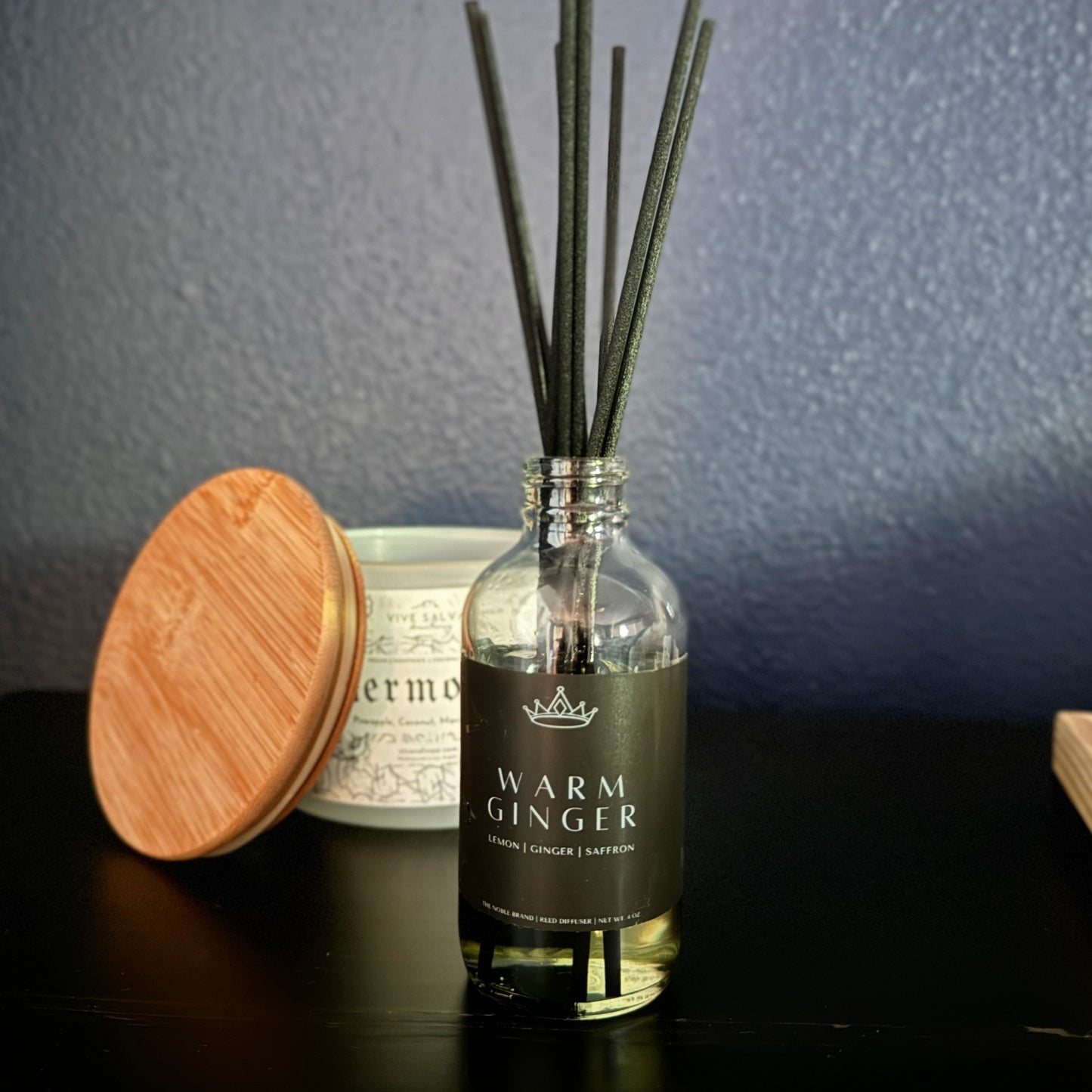 The warm ginger diffuser with the Hermosa candle in the background