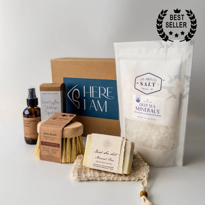 Contents in the Magnesium Bath Box, including Zechstein sea salts, body brush, shower spray, and soap.