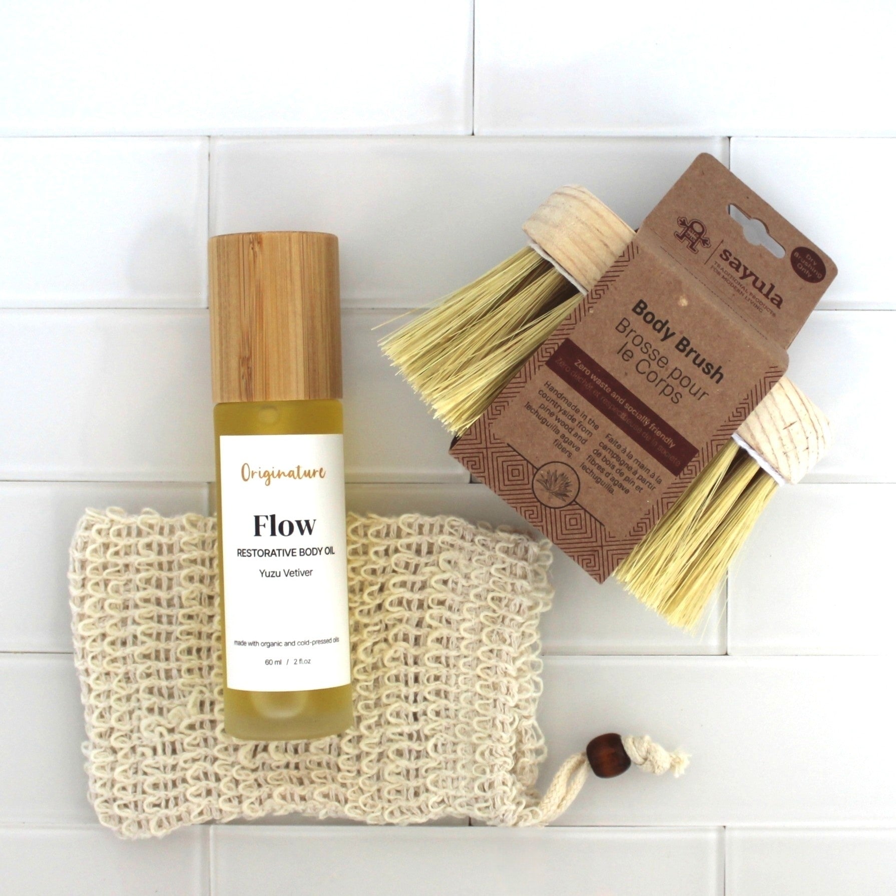 The March Self-Care Subscription Box with body brush, sisal bag, and body oil.