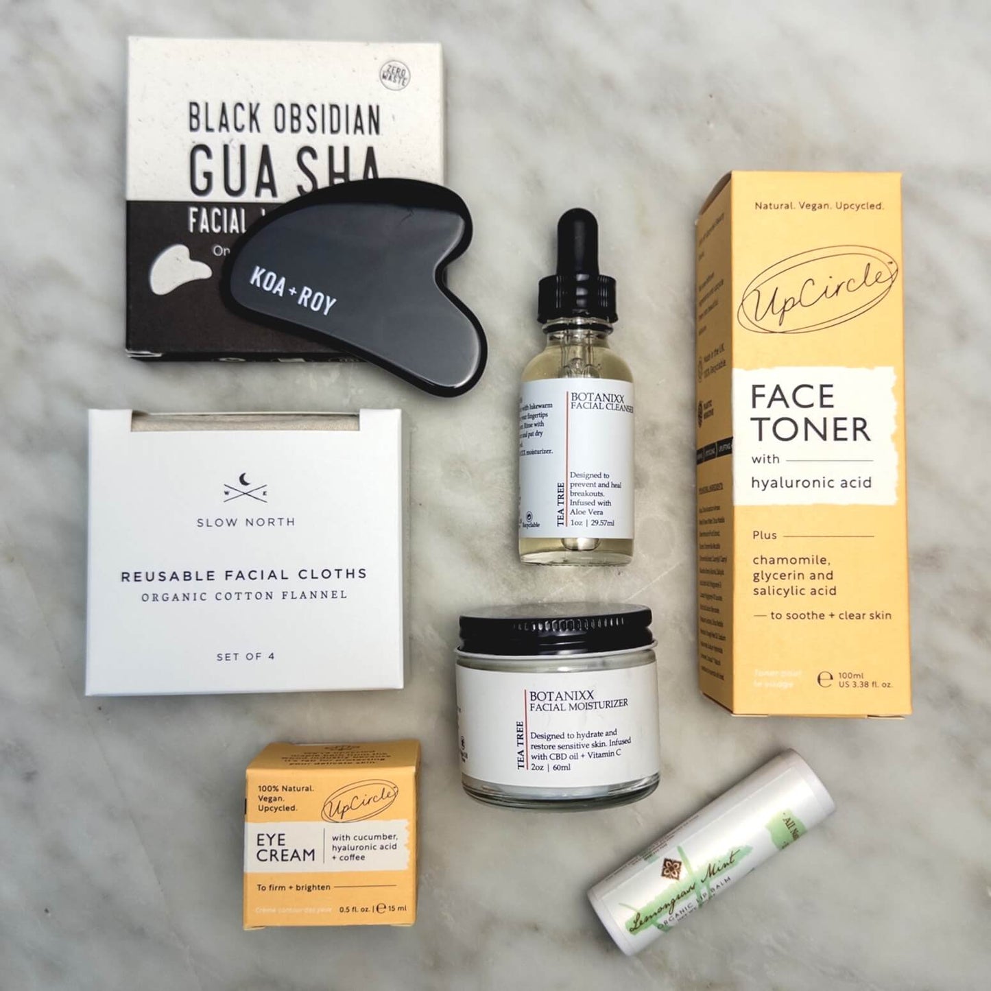 Your new Morning face care routine including gua sha, face toner and eye cream, cleanser and moisturizer, reusable cloths, and lip balm