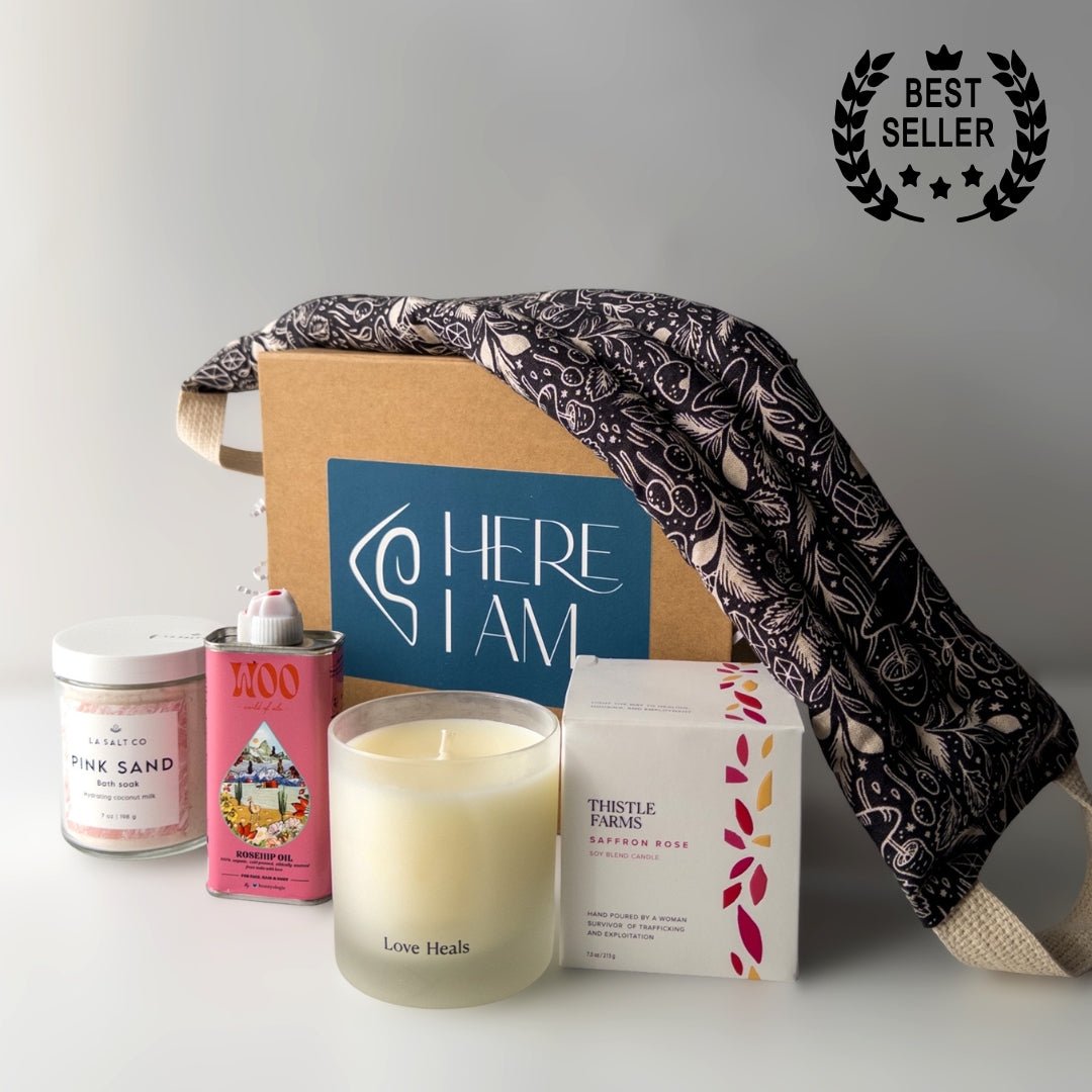 Contents of the Rest & Relaxation Gift Box including weighted neck wrap, candle, oil, and Pink Sand bath soak