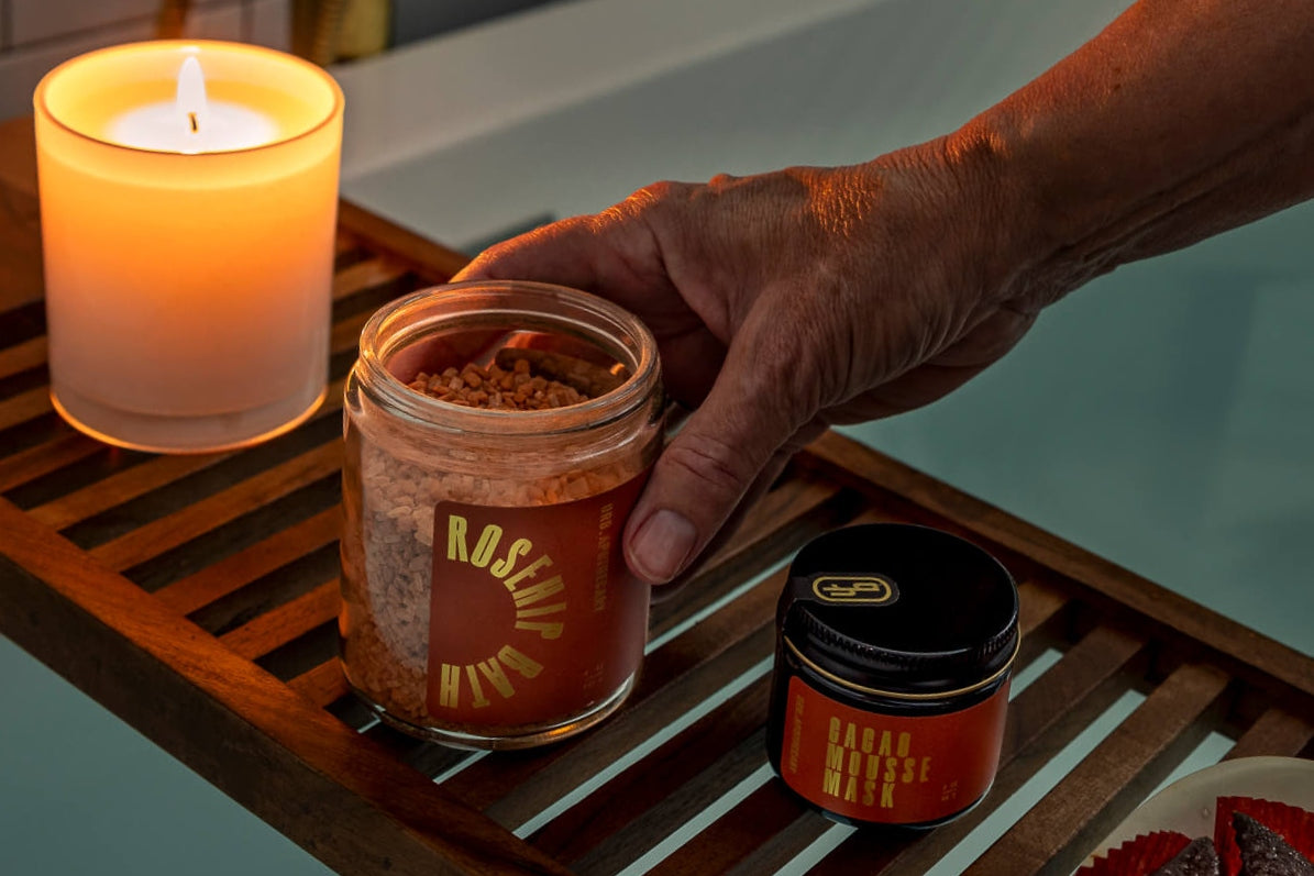 Skin nourishing bath and face products for self-care with an essential oil candle 