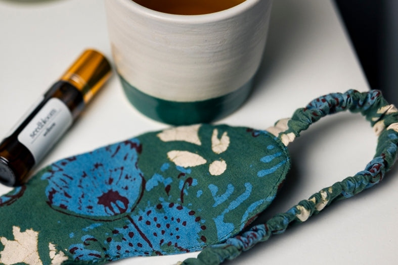 Cotton eye mask with aromatherapy roll-on and nighttime tea for a completely natural sleep kit