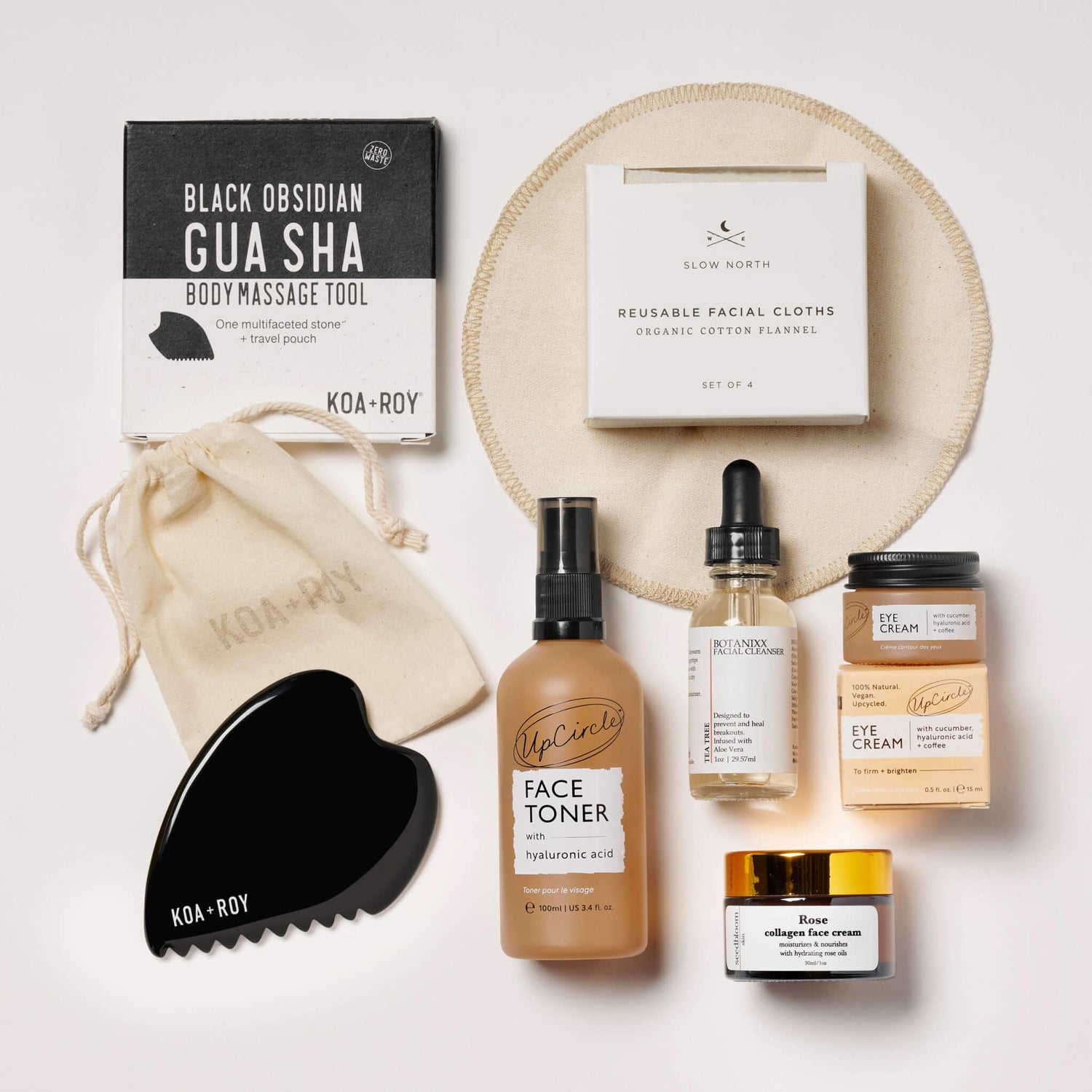 Your new face care routine including gua sha, face toner and eye cream, cleanser and moisturizer, reusable cloths, and lip balm for a healthy glow
