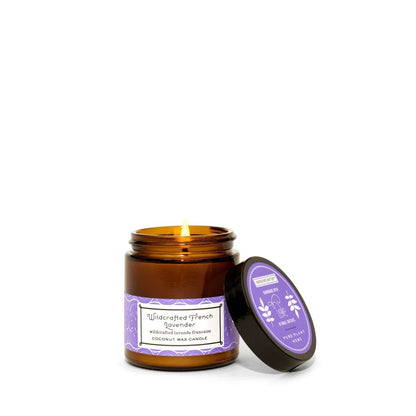 Pure Plant Home French Lavender Aromatherapy Candle in an amber glass jar with purple lid and label on a white background