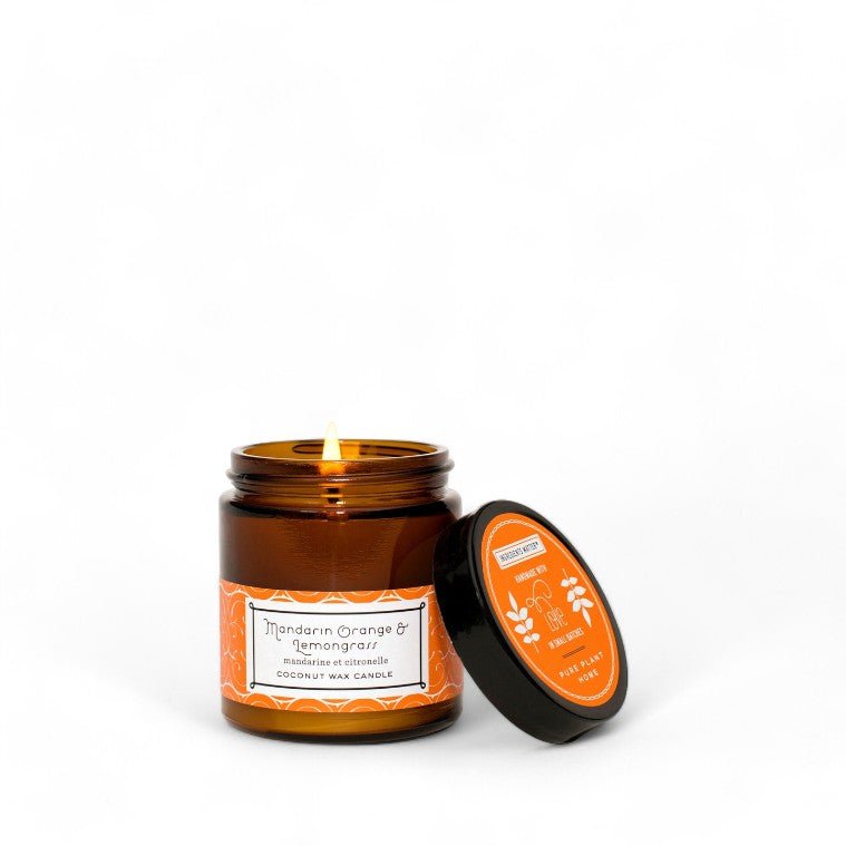 Pure Plant Home Mandarin Orange & Lemongrass candle in an amber glass jar