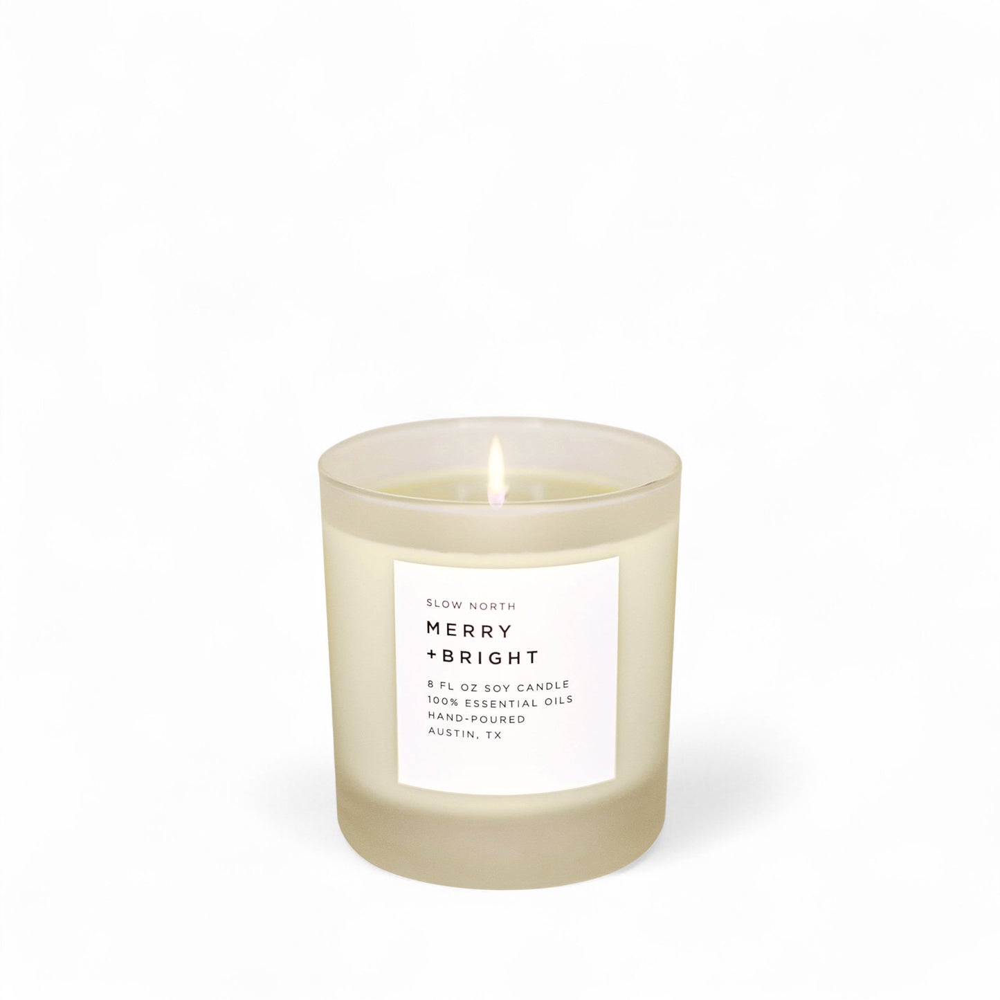 The Merry and Bright essential oil candle from Slow North on white background