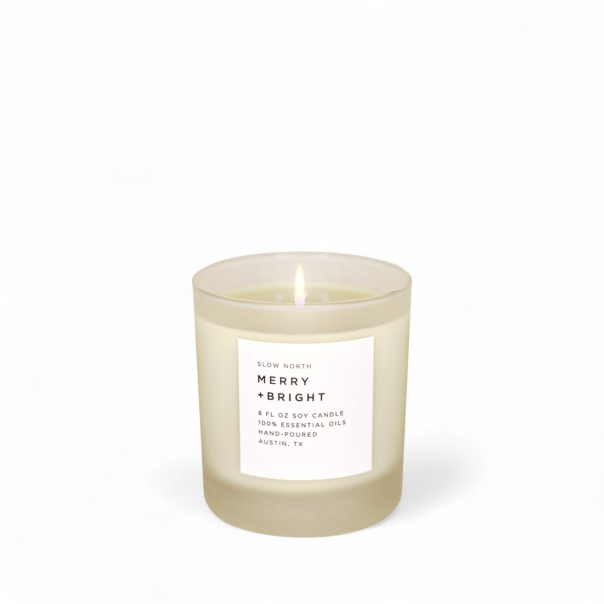 The Merry and Bright essential oil candle from Slow North on white background
