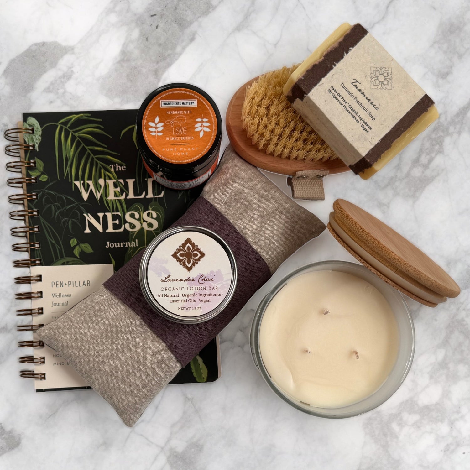 A photograph of a selection of self-care products available from Here I Am