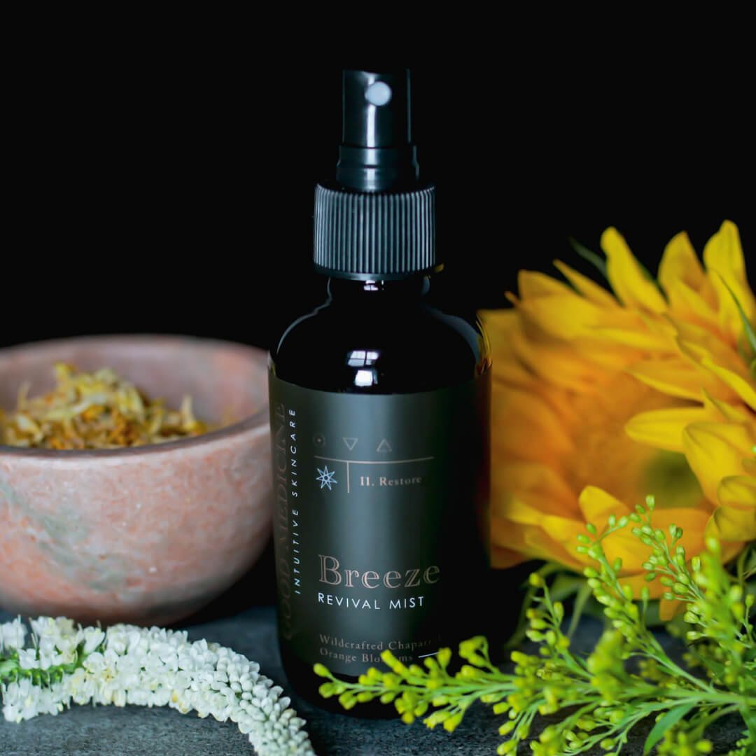 4 oz bottle of the Breeze Toner with flowers