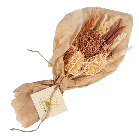 Bouquet of dried flowers wrapped in tissue