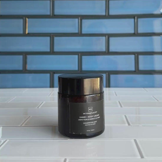 Video of woman opening jar of the Cedarwood Mint Body Lotion