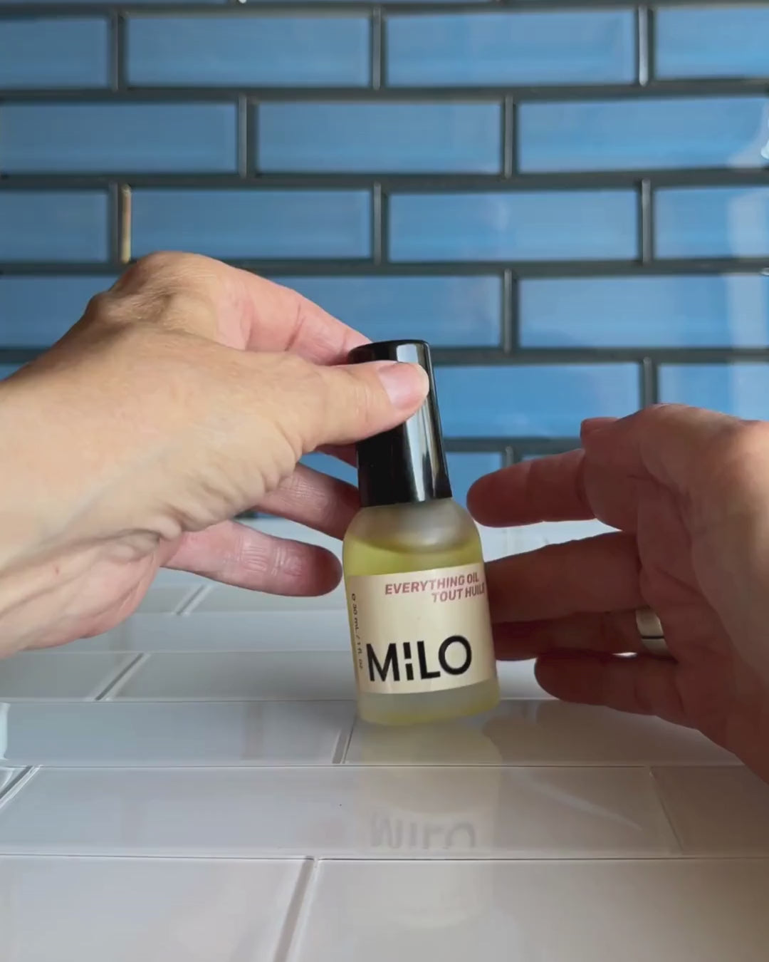 Video of woman using the MILO Everything Oil 