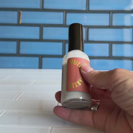 Woman demonstrating use of the Willow Cleanser