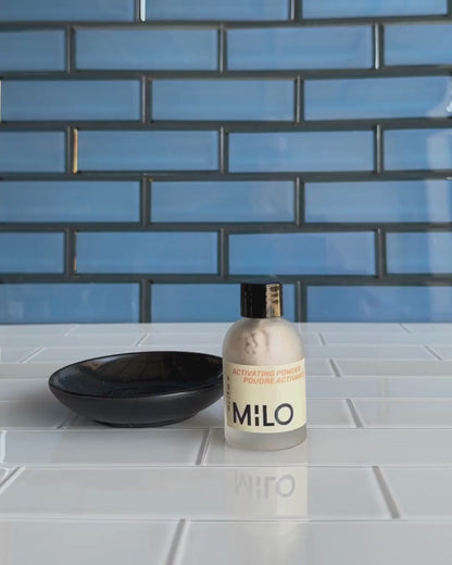 Video of woman demonstrating how to mix Activating Powder with water.