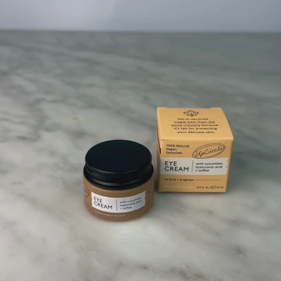 Video of woman opening jar of Eye Cream with Hyaluronic Acid & Coffee Oil