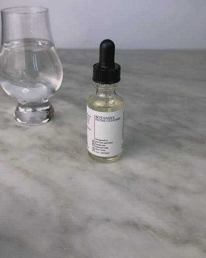 Woman demonstrating using the Tea Tree Face Cleanser with water