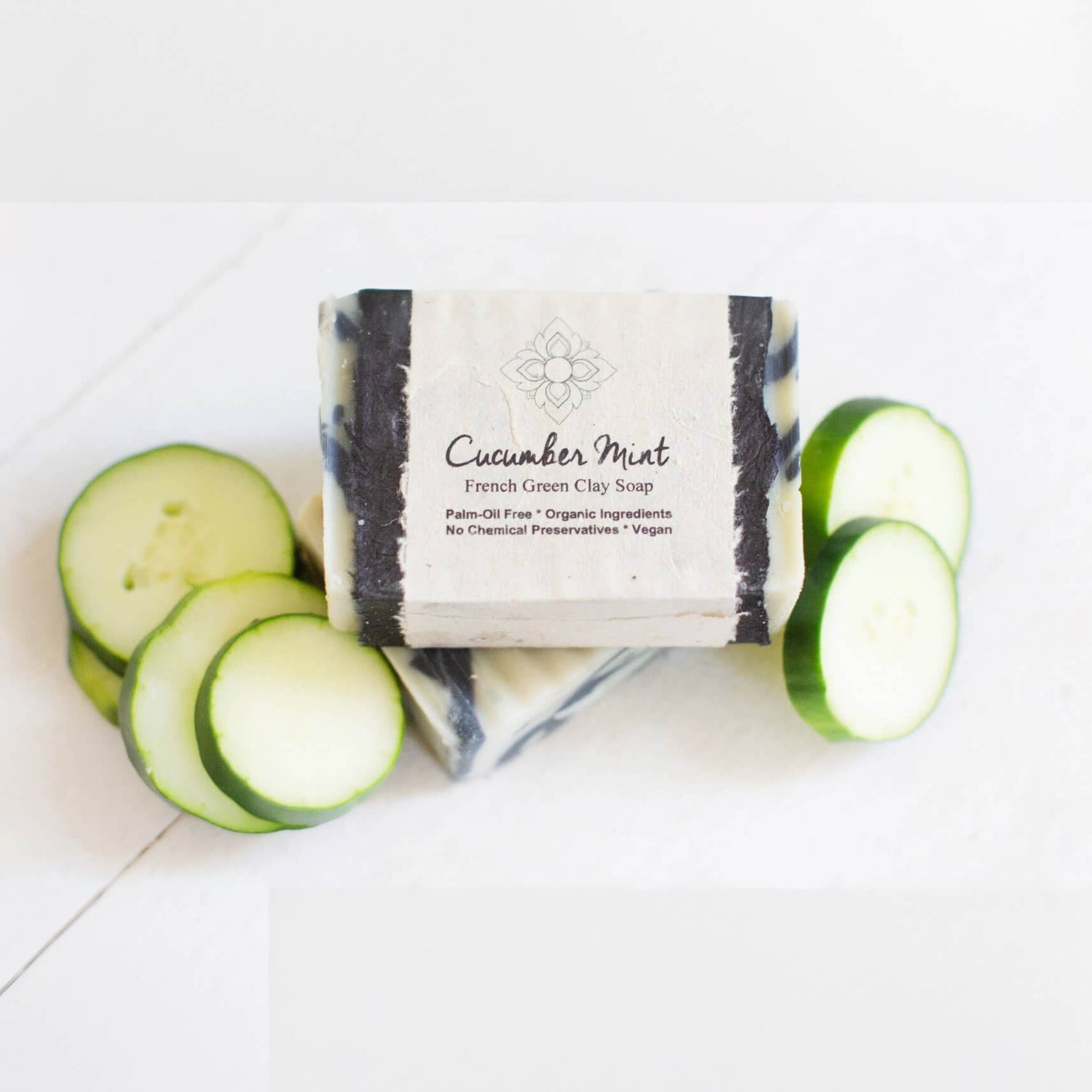Cucumber Mint French Green Clay Soap with cucumber slices on a white background