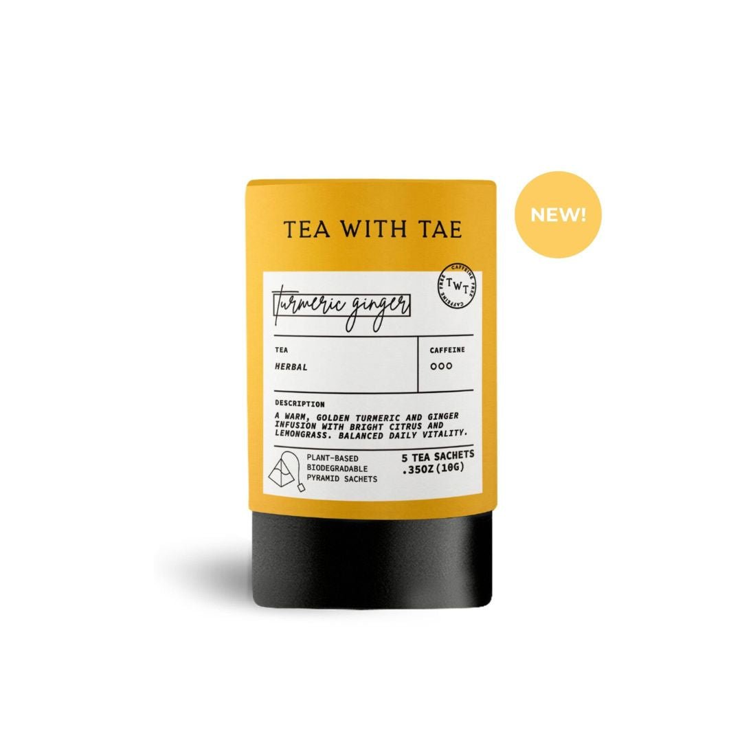 Turmeric Ginger Tea package with yellow lid and black base labeled 'Tea with Tae' on a white background.