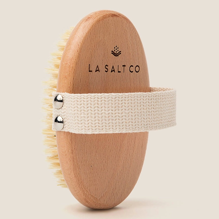 View of the top side of the plant-based body brush from LA Salt Co
