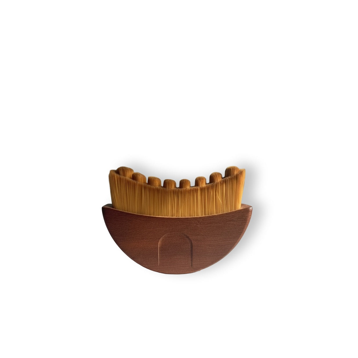 Gua sha brush made of solid American walnut wood for facial lymphatic drainage.