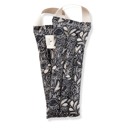 Stress relief weighted neck wrap with mushroom pattern unboxed on a white background