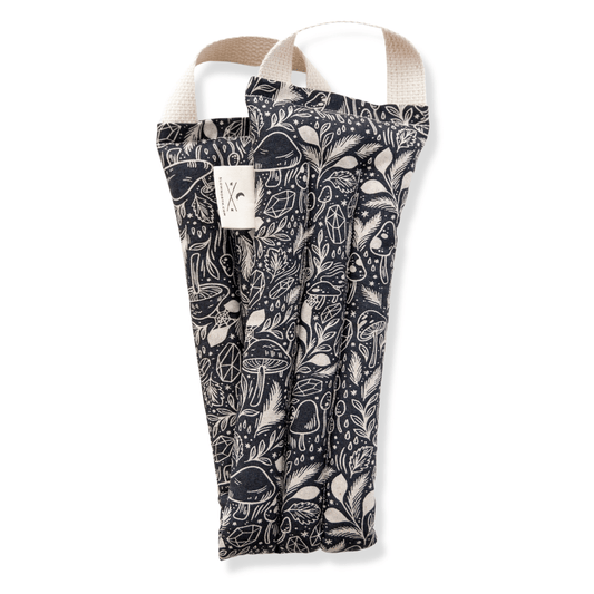 Stress relief weighted neck wrap with mushroom pattern unboxed on a white background