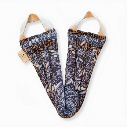 Weighted neck wrap with mushroom pattern unboxed and open on a white background