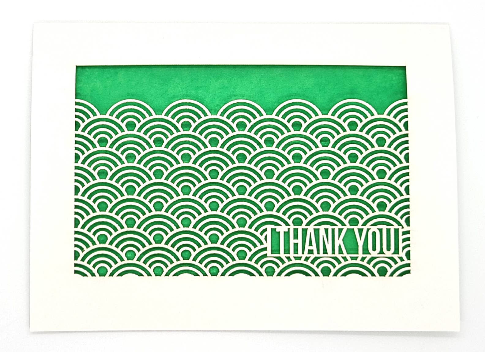 Thank You Greeting card with laser cut design of waves on green background