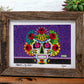 Vivid Sugar Skull print in Reclaimed Wood Frame on shelf with plants