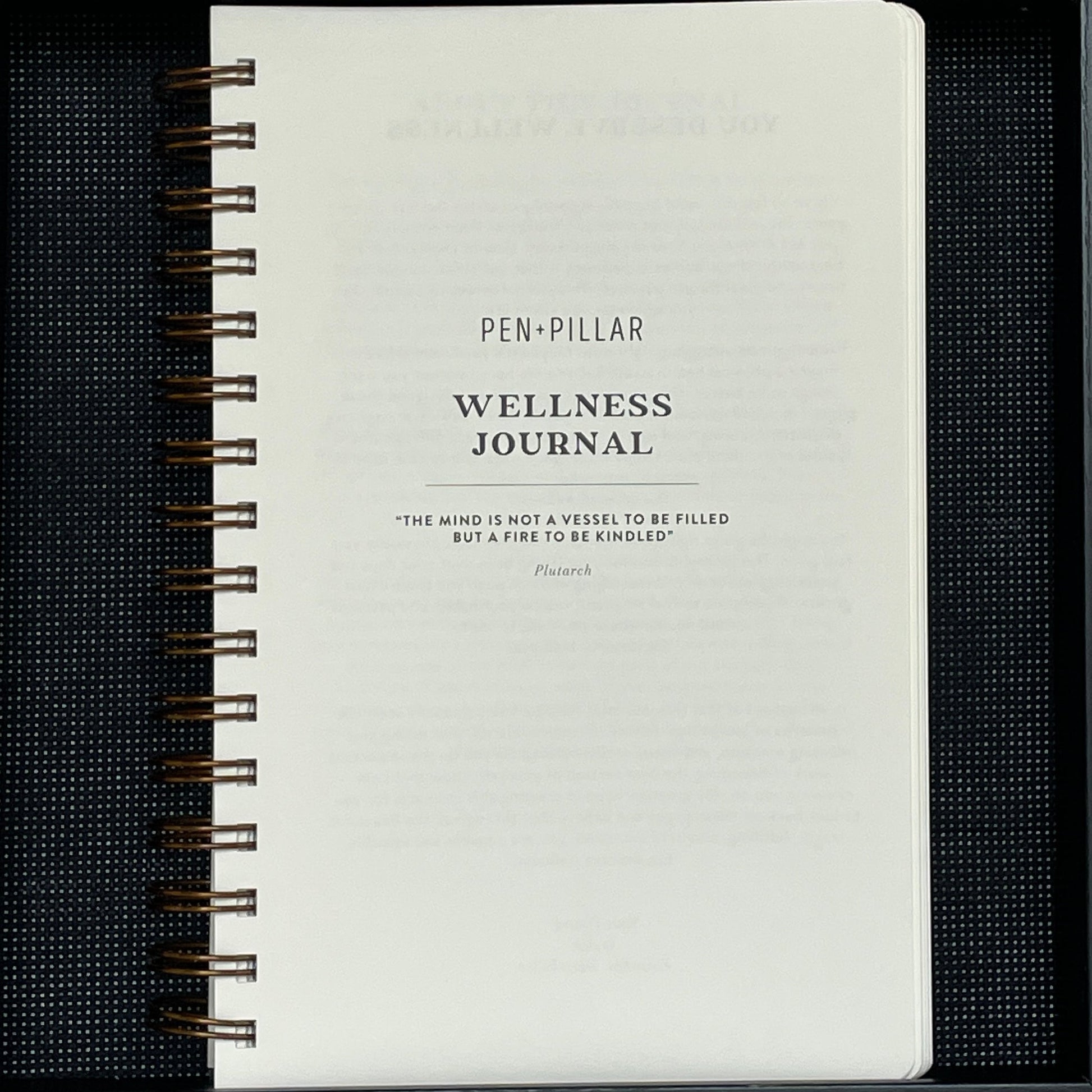 Wellness Journal open to the cover page